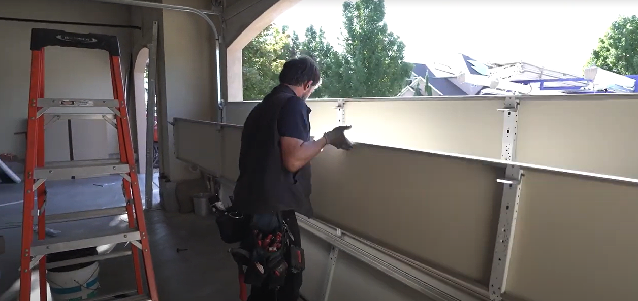 replacing garage door section