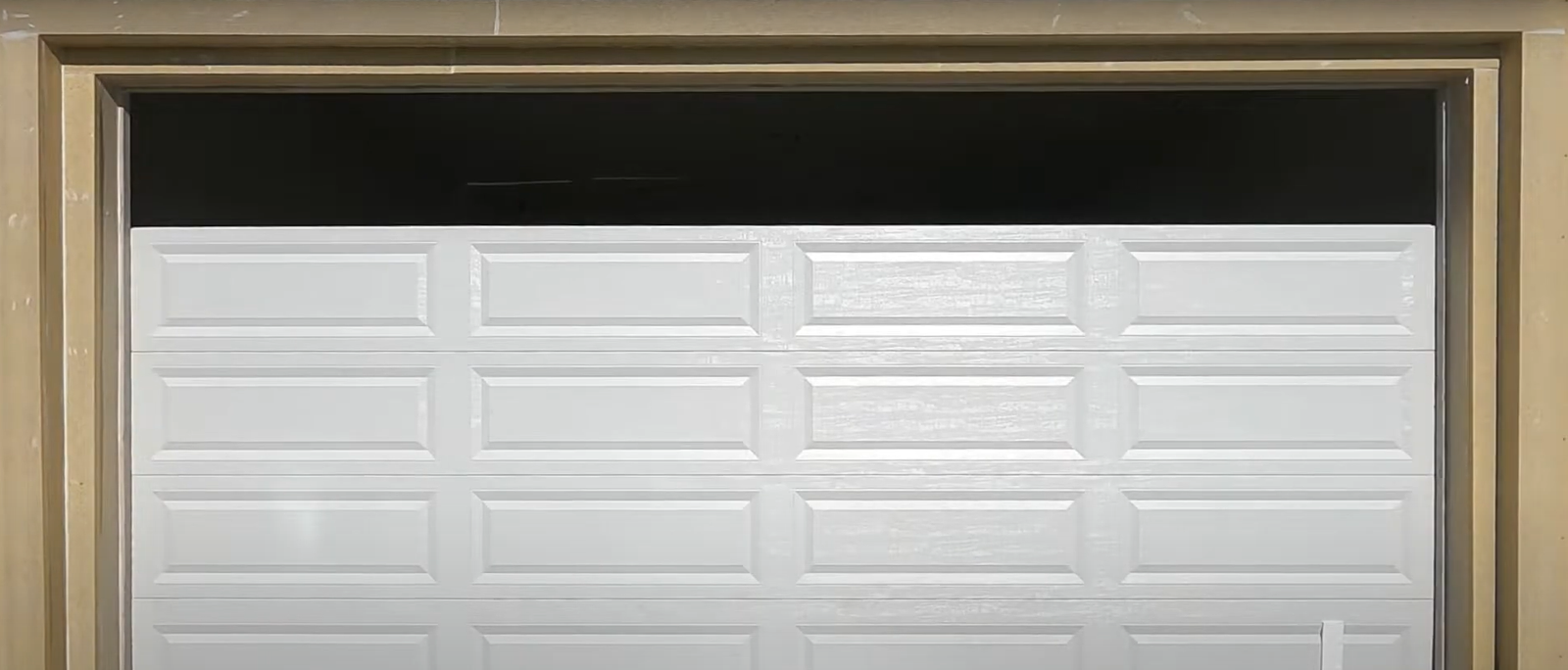 a photo of near finish garage door installation