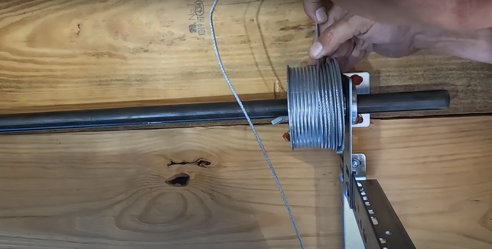 repairing a lose garage door cable