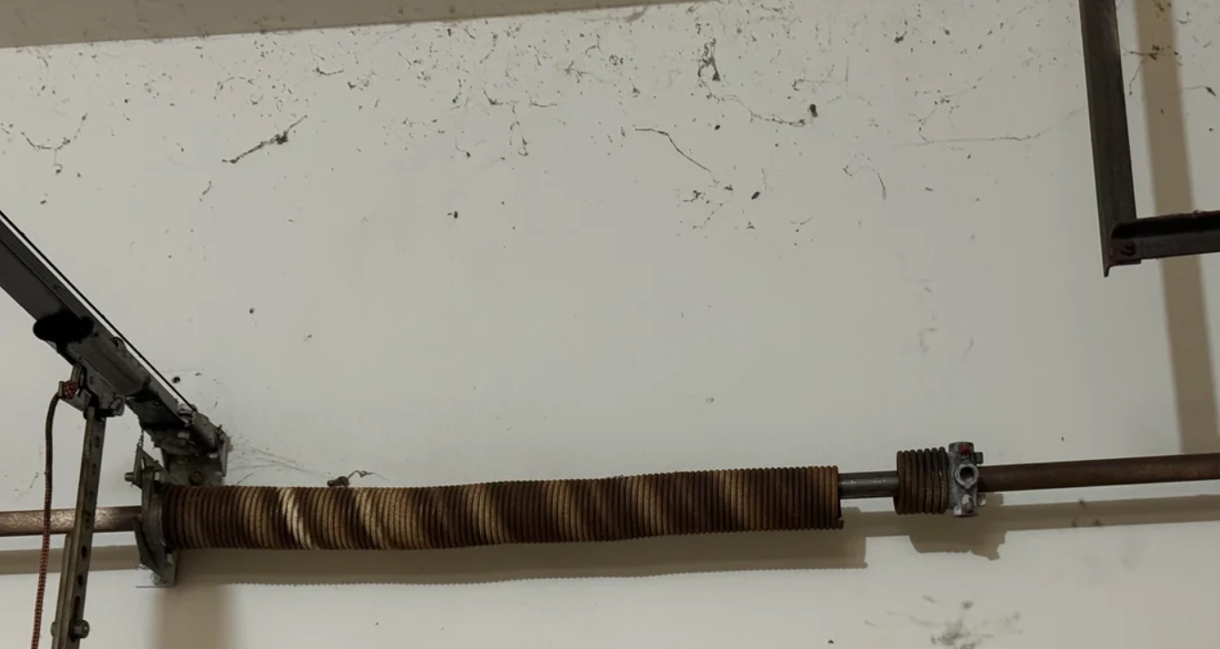 a broken garage door spring that need to be repair