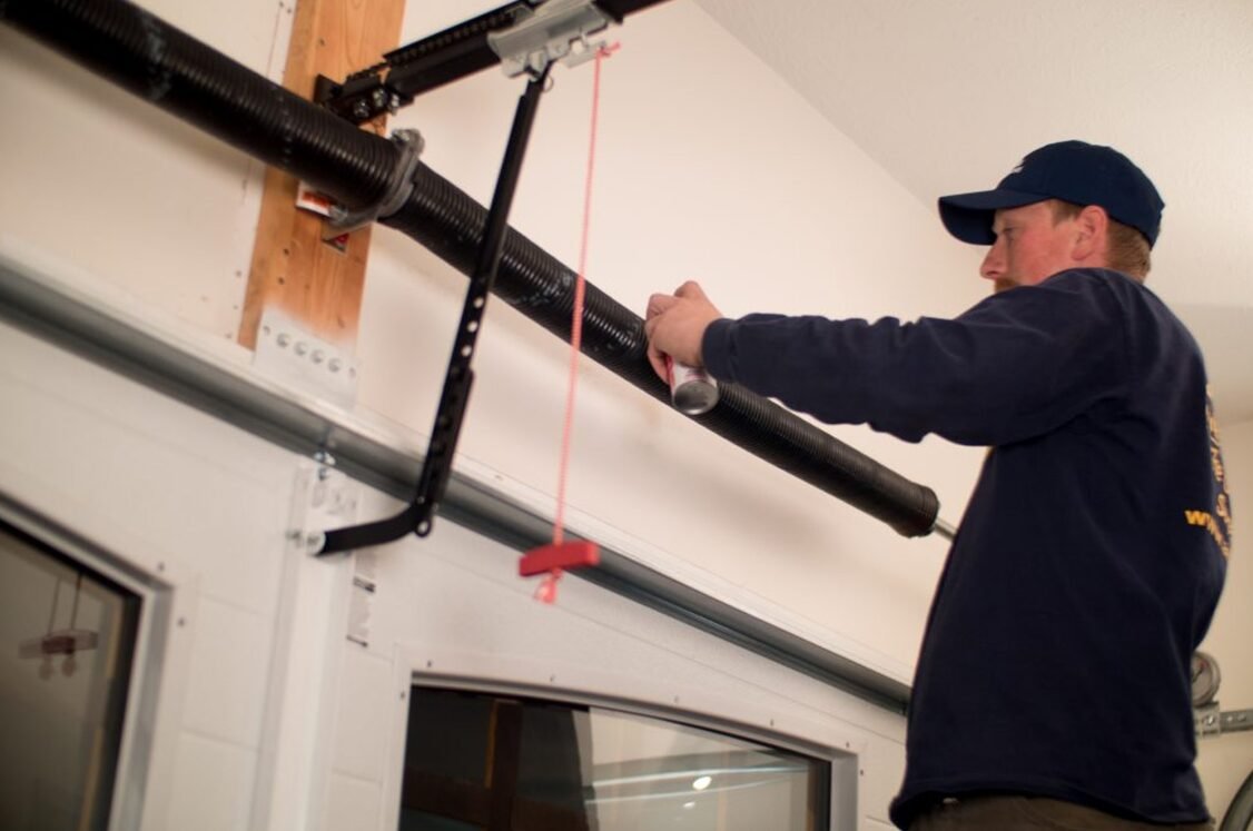 Garage Door Spring Replacement & Adjustment